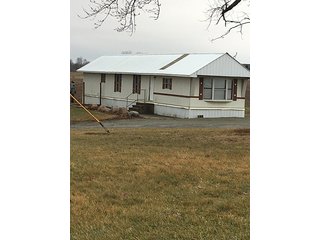 6 Acres with mobile home, 54' x 88' heated and insulated pole building with office, equipment storage, shop, overhead storage and restroom.  Well and 2 septic systems.  24' x 40' livestock or storage building.

Great for mini-farm or additional storage and shop for local farmers.  Excellent potential building site. - 6 Acres with Mobile Home, Pole Building & Storage or Livestock Building